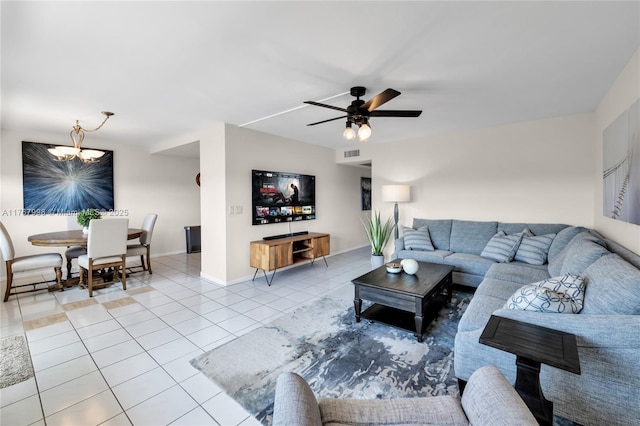 4032 Farnham O Unit 4032, Deerfield Beach, FL 33442 - living room with tile patterned floors, a chandelier, a ceiling fan, and baseboards