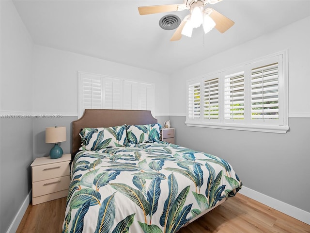 2190 NE 59th Ct, Fort Lauderdale, FL 33308 - bedroom with visible vents, baseboards, wood finished floors, and a ceiling fan
