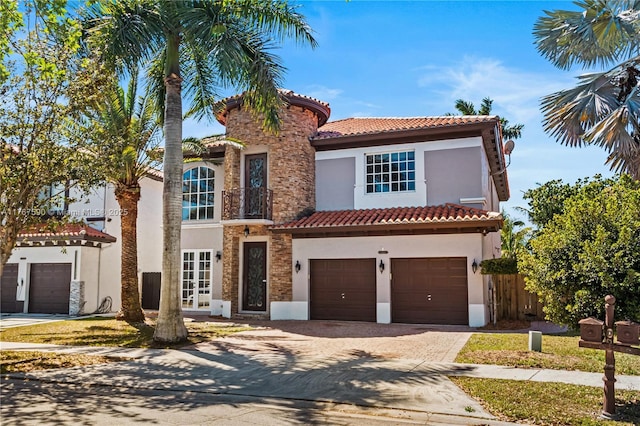 2080 SW 152nd Pl, Miami, FL 33185 - mediterranean / spanish-style home with driveway, french doors, a tile roof, a garage, and stucco siding