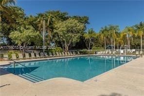 7833 Sanibel Dr Unit 7833, Tamarac, FL 33321 - pool featuring a patio