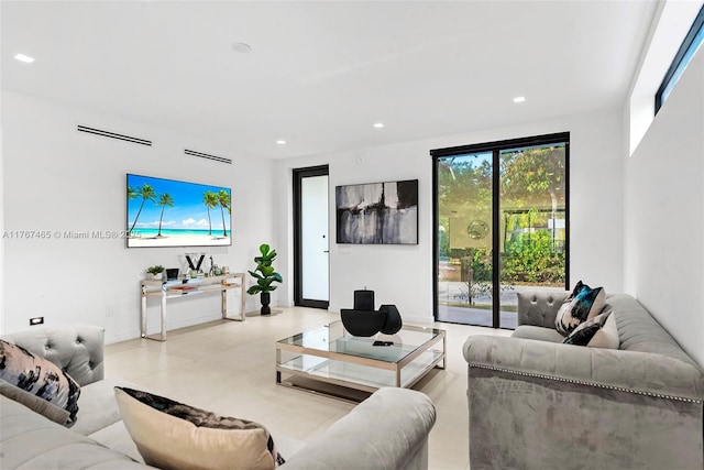 2572 NE 182nd Ter, North Miami Beach, FL 33160 - living room featuring visible vents and recessed lighting