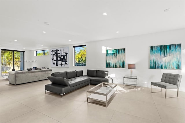 2572 NE 182nd Ter, North Miami Beach, FL 33160 - living area with tile patterned flooring and recessed lighting