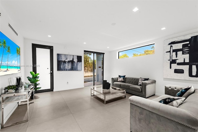 2572 NE 182nd Ter, North Miami Beach, FL 33160 - living room featuring recessed lighting