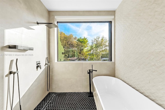2572 NE 182nd Ter, North Miami Beach, FL 33160 - full bath with a soaking tub and a tile shower
