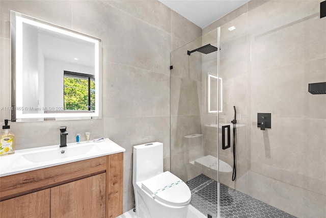 2572 NE 182nd Ter, North Miami Beach, FL 33160 - full bathroom featuring vanity, tile walls, toilet, and a stall shower