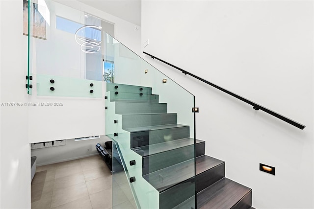 2572 NE 182nd Ter, North Miami Beach, FL 33160 - stairs with tile patterned flooring
