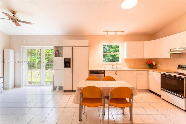 9055 SW 158th St, Palmetto Bay, FL 33157 - kitchen with paneled refrigerator, a sink, white electric stove, dishwasher, and under cabinet range hood