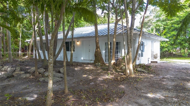 9055 SW 158th St, Palmetto Bay, FL 33157 - ranch-style house with metal roof