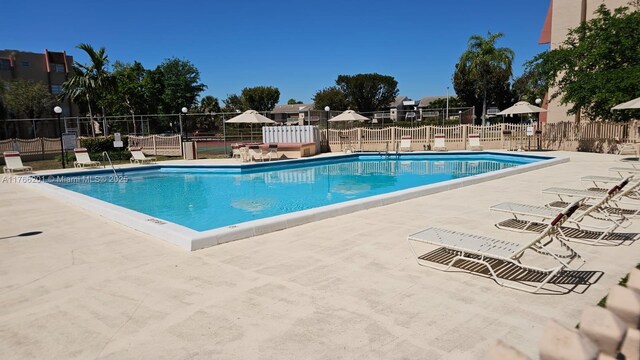 13715 Kendale Lakes Cir Unit A-201, Miami, FL 33183 - community pool featuring a patio