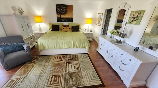 2112 Newport U Unit 2112, Deerfield Beach, FL 33442 - bedroom featuring dark wood-style flooring