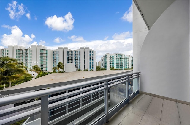 balcony featuring a city view