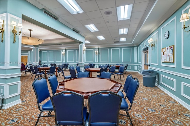 12901 SW 15th Ct Unit 208V, Pembroke Pines, FL 33027 - carpeted dining area with a decorative wall and a drop ceiling