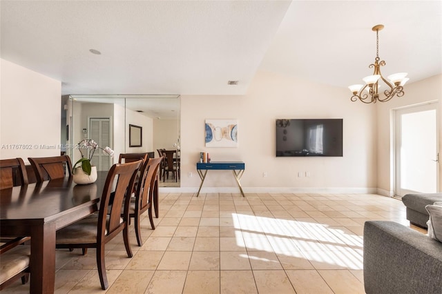 dining space featuring light tile patterned floors, visible vents, baseboards, and a chandelier