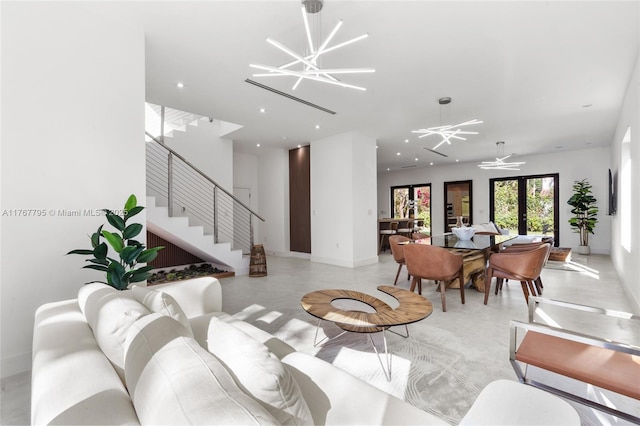 2523 Red Rd, Coral Gables, FL 33134 - living area featuring stairs, recessed lighting, baseboards, and finished concrete flooring
