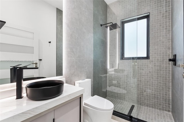 2523 Red Rd, Coral Gables, FL 33134 - full bathroom featuring tiled shower, vanity, toilet, and tile walls