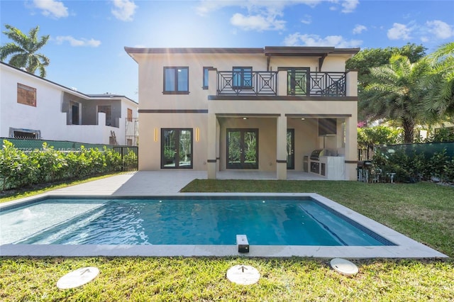 2523 Red Rd, Coral Gables, FL 33134 - back of house with a balcony, french doors, stucco siding, and a patio