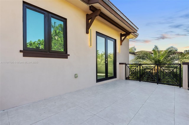 2523 Red Rd, Coral Gables, FL 33134 - patio terrace at dusk with a patio