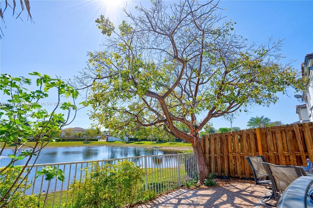 7807 NW 114th Pl, Doral, FL 33178 - exterior space with a water view and fence