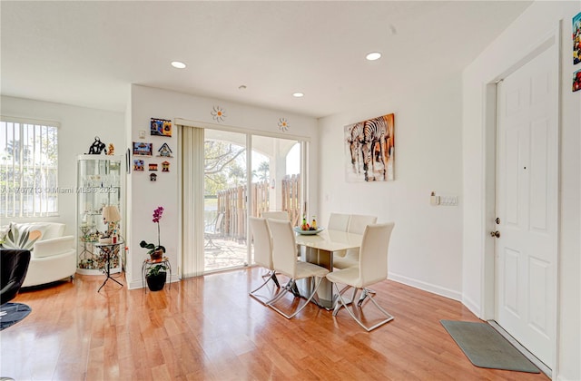 7807 NW 114th Pl, Doral, FL 33178 - dining room with recessed lighting, light wood-type flooring, and baseboards