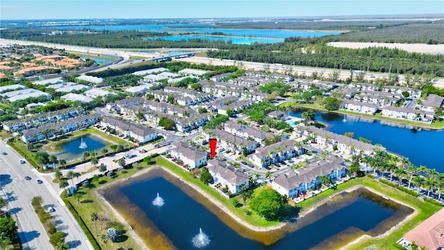 7807 NW 114th Pl, Doral, FL 33178 - drone / aerial view featuring a residential view and a water view