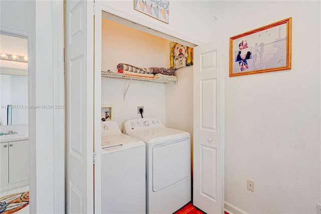 7807 NW 114th Pl, Doral, FL 33178 - laundry room with a sink, laundry area, and washer and clothes dryer