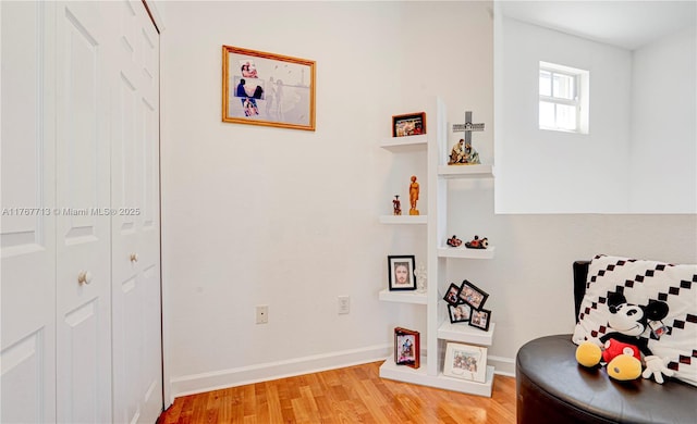 7807 NW 114th Pl, Doral, FL 33178 - sitting room featuring light wood-style flooring and baseboards