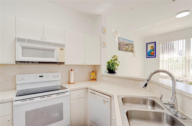 7807 NW 114th Pl, Doral, FL 33178 - kitchen with a sink, white appliances, backsplash, and light countertops