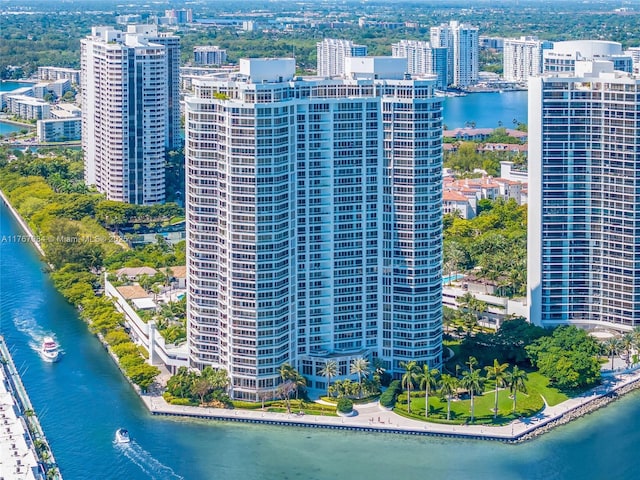 aerial view featuring a view of city and a water view