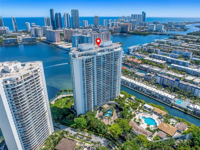 drone / aerial view with a water view and a city view