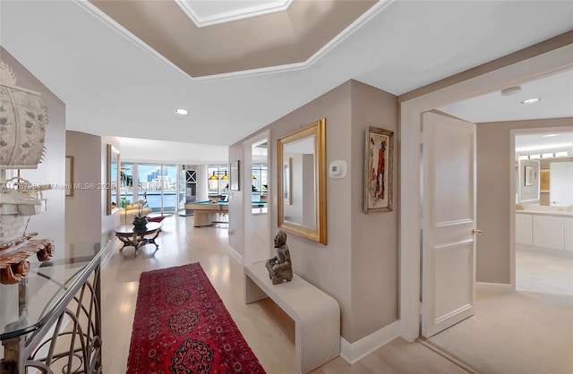 corridor with recessed lighting, wood finished floors, and baseboards