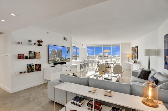 400 Alton Rd Unit 911, Miami Beach, FL 33139 - living area with baseboards, expansive windows, visible vents, and recessed lighting