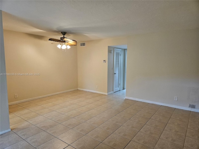 250 Layne Blvd Unit 105, Hallandale Beach, FL 33009 - spare room featuring a textured ceiling, visible vents, baseboards, and a ceiling fan