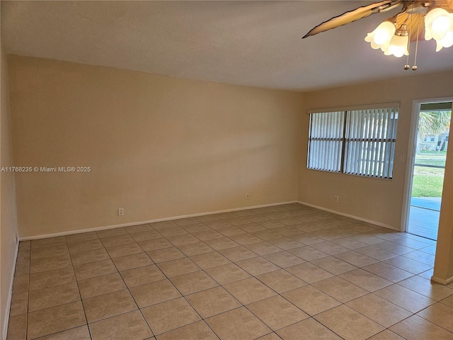 250 Layne Blvd Unit 105, Hallandale Beach, FL 33009 - empty room featuring light tile patterned flooring, baseboards, and ceiling fan
