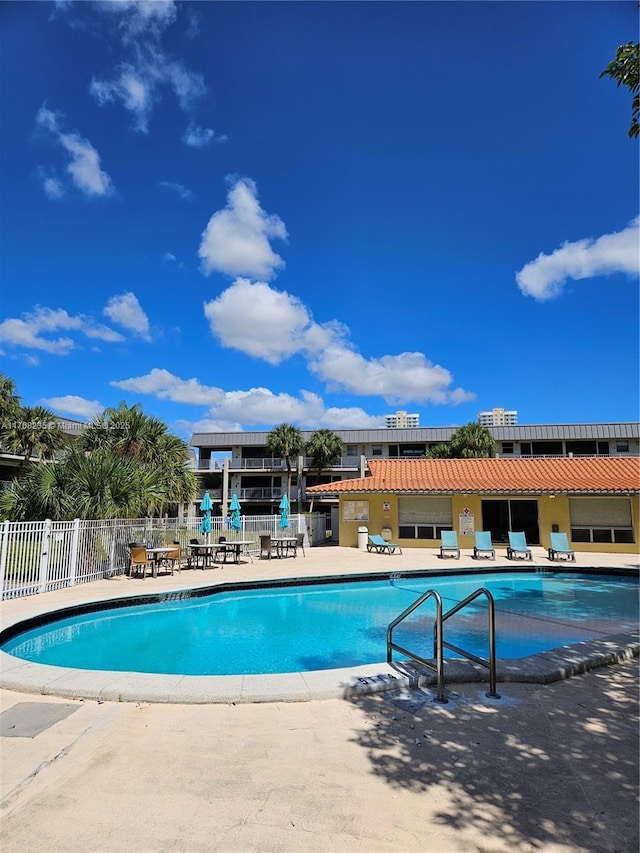 250 Layne Blvd Unit 105, Hallandale Beach, FL 33009 - pool with fence and a patio area