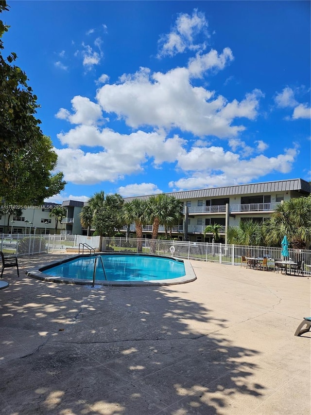 250 Layne Blvd Unit 105, Hallandale Beach, FL 33009 - pool with fence