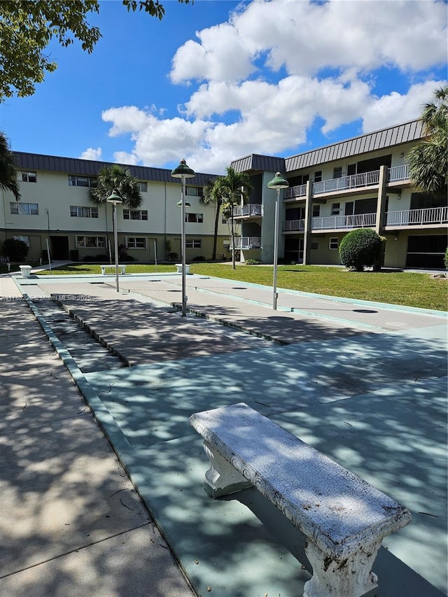 250 Layne Blvd Unit 105, Hallandale Beach, FL 33009 - view of property's community with a residential view