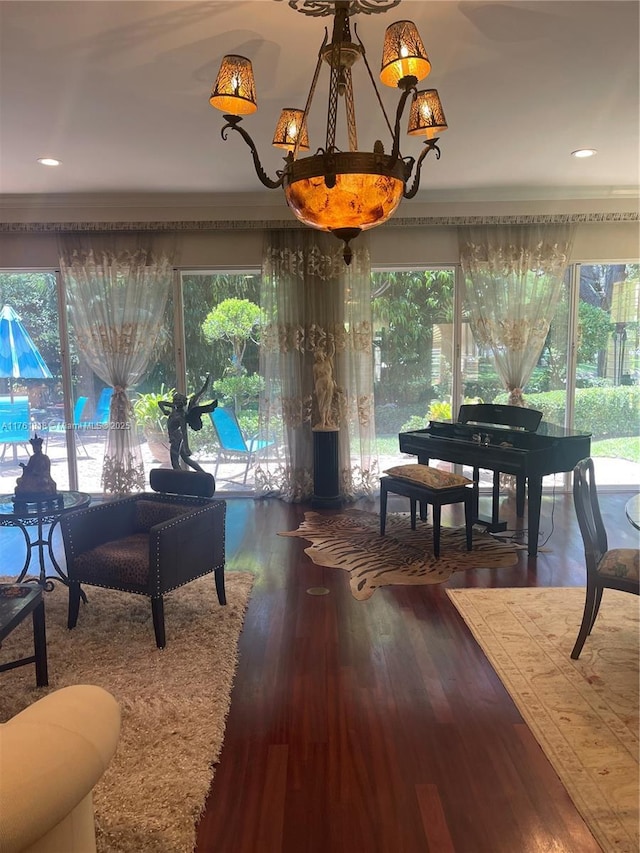 common area featuring ornamental molding and recessed lighting