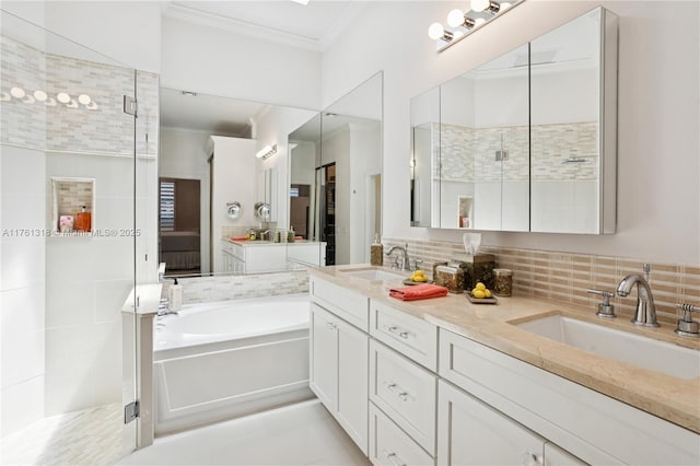 full bath with crown molding, double vanity, a tile shower, a garden tub, and backsplash