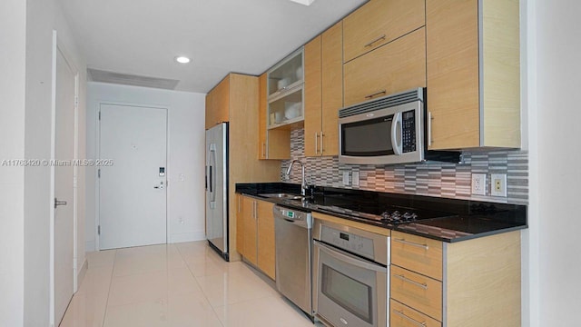 60 SW 13th St Unit 3820, Miami, FL 33130 - kitchen featuring stainless steel appliances, a sink, decorative backsplash, light tile patterned flooring, and recessed lighting