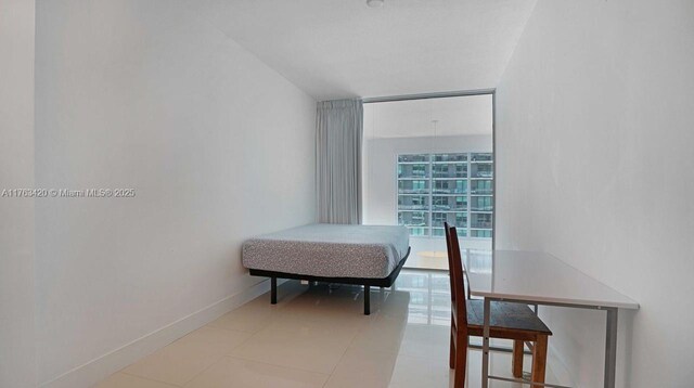 60 SW 13th St Unit 3820, Miami, FL 33130 - dining area with baseboards