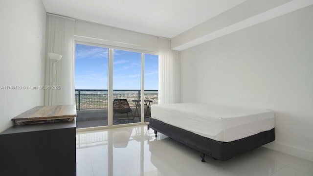 60 SW 13th St Unit 3820, Miami, FL 33130 - bedroom featuring tile patterned floors and baseboards