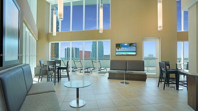 60 SW 13th St Unit 3820, Miami, FL 33130 - tiled living area featuring a towering ceiling and a city view