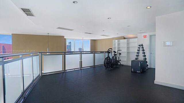 60 SW 13th St Unit 3820, Miami, FL 33130 - workout area with recessed lighting and baseboards