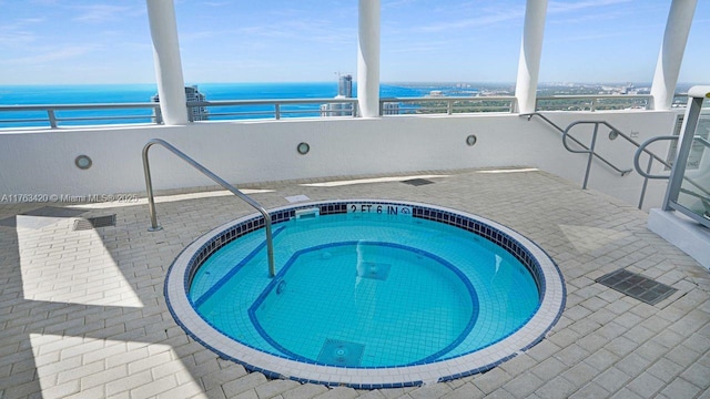 60 SW 13th St Unit 3820, Miami, FL 33130 - view of pool featuring a water view and a hot tub
