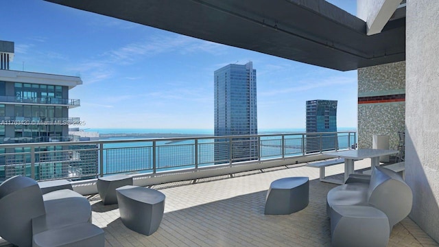 60 SW 13th St Unit 3820, Miami, FL 33130 - view of patio with a water view and a balcony