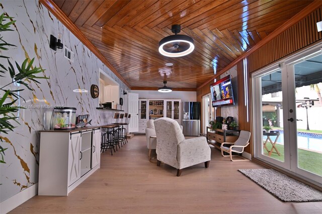 30 SW 136th Ave, Miami, FL 33184 - living area featuring light wood-type flooring, visible vents, wood ceiling, and french doors