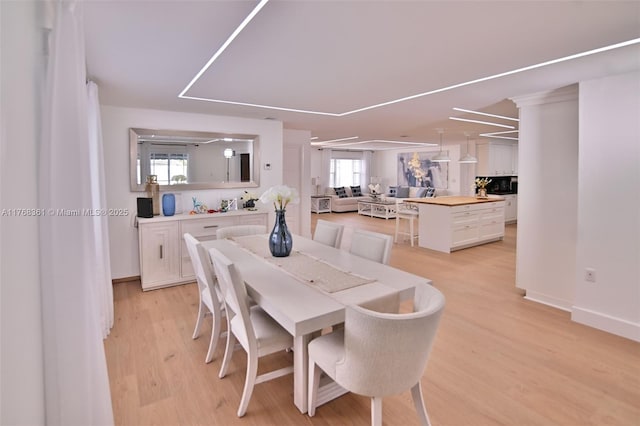 30 SW 136th Ave, Miami, FL 33184 - dining space with baseboards, light wood-type flooring, and plenty of natural light