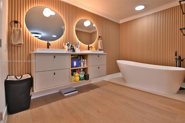 30 SW 136th Ave, Miami, FL 33184 - bathroom with a freestanding bath, double vanity, ornamental molding, and wood finished floors