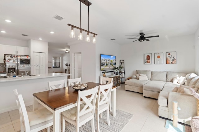 dining space featuring recessed lighting, light tile patterned floors, a ceiling fan, and visible vents