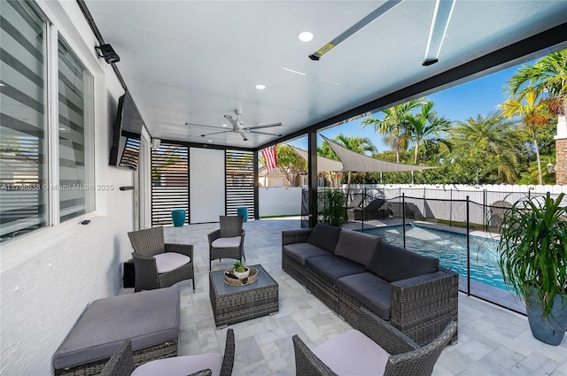 view of patio / terrace featuring ceiling fan, a fenced in pool, an outdoor hangout area, and a fenced backyard